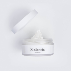Melderskin shaving cream with open lid